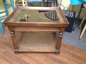 This is the before picture of the glass coffee table. 