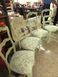 green chairs in shop