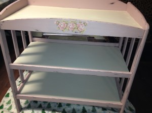 After: Painted pink and distressed baby changing table