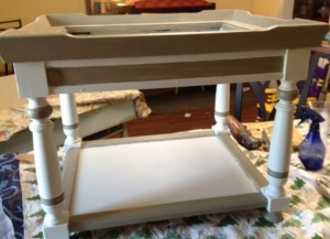 I painted the table all one color - sea salt and then painted some parts grey. 